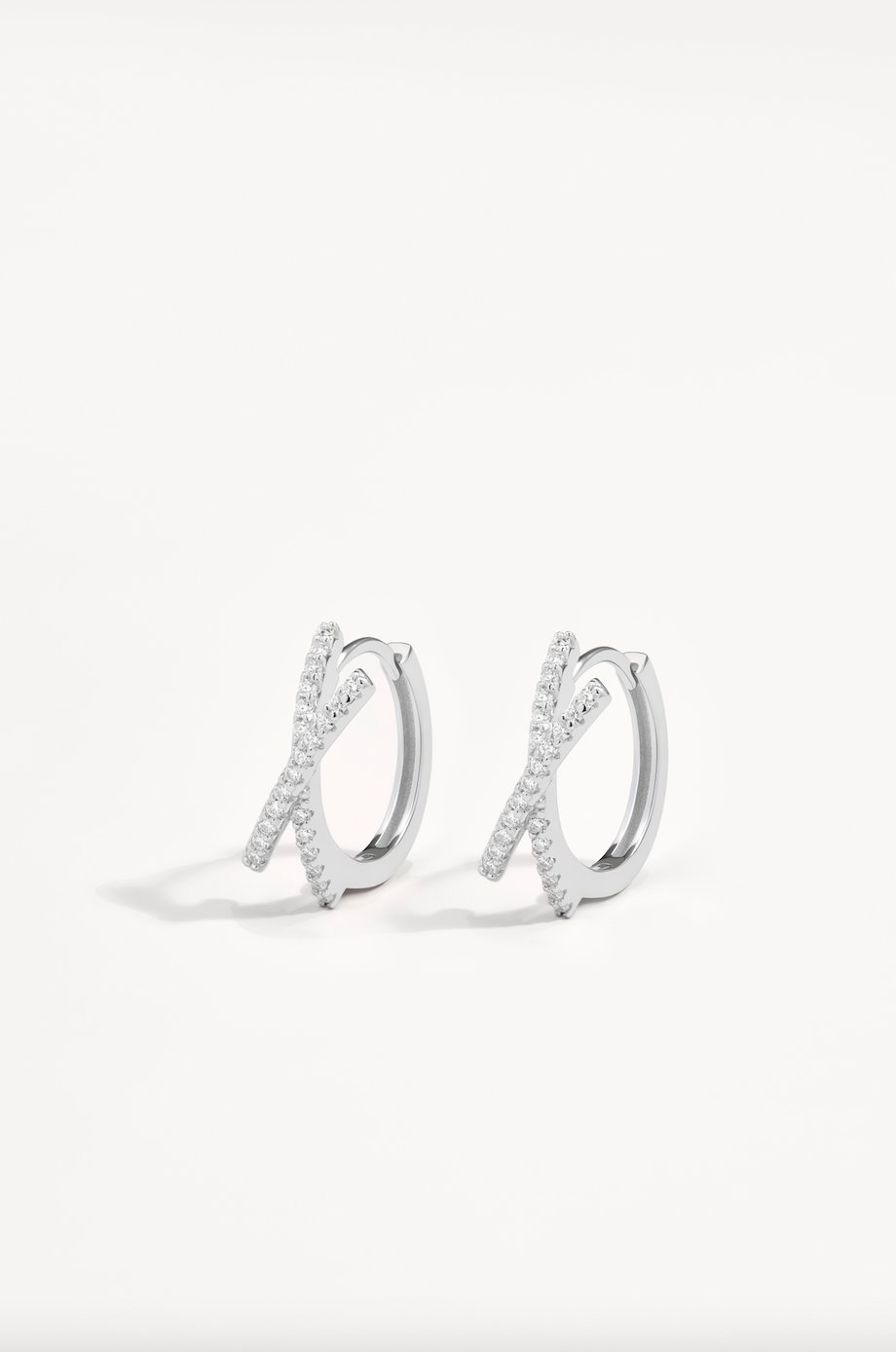 Kiss Kiss Moissanite Huggies in Sterling Silver